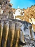 Sukhothai, Thailand: Looking up at Buddha